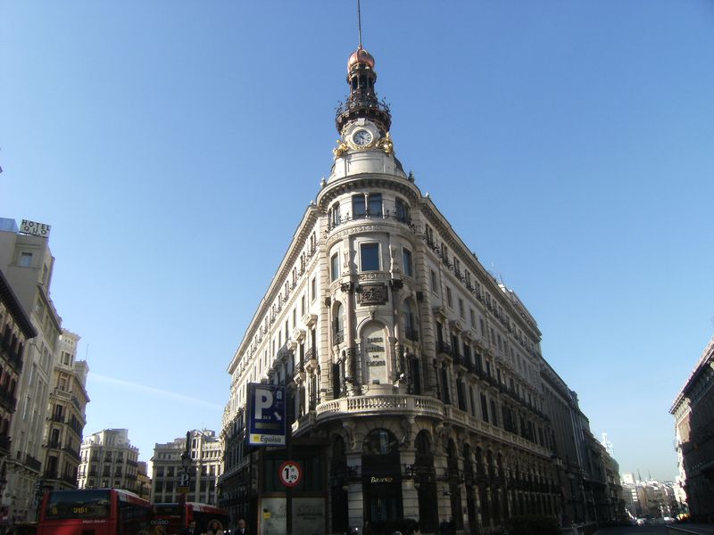 Four Seasons Hotel Madrid — historic Palacio de la Equitativa building with copper dome